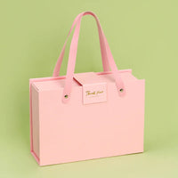 Sacola rígida com fecho magnético e alça